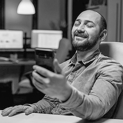 Cheerful entrepreneur saying hello talking on video call using p